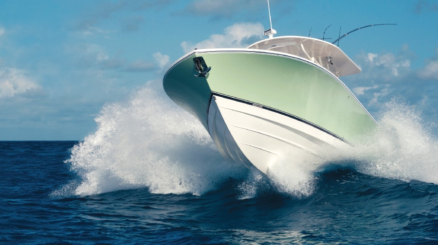 How do traditional Deep-V hull designs compare to their high-speed, stepped hull counterparts?